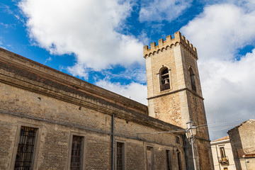 Fototapeta na wymiar Italy, Sicily, Messina Province, Montalbano Elicona. The Basilica of Santa Maria Assunta.Bell tower, in the medieval hill town of Montalbano Eliconta.