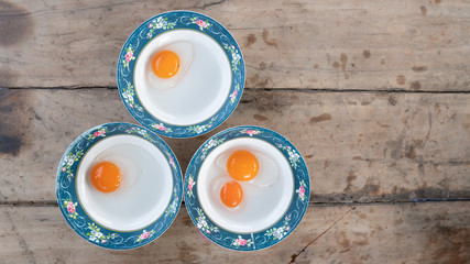Duck egg yolks in comparison to egg completion.