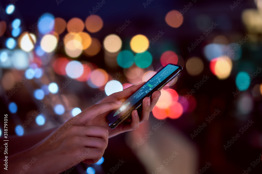 Poster close-up of hands scanning fingerprint on smartphone to unlock mobile phone on bokeh colors light in