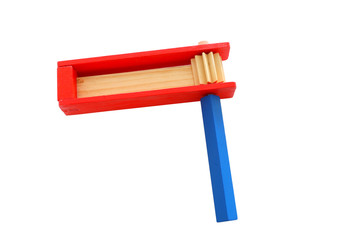 wooden colorful noisemaker or gragger for purim celebration holiday (jewish holiday) isolated on white