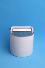 White ceramic salt shaker in color background