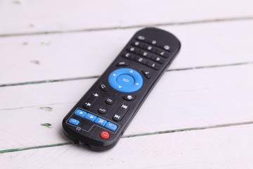 TV remote control in color background