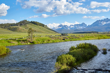 Fototapeta premium River runs through it in the mountains near Stanley, Idaho with the Sawtooth mts in the background