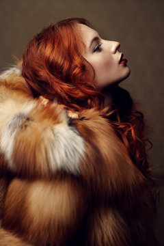 redhead beauty in fur coat