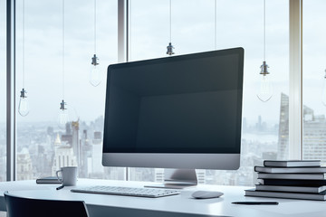 Designer workplace with white desk, laptop, cup of coffee and light bulbs, on a large window background with city view. 3D Rendering