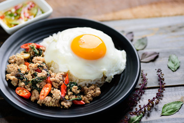 Thai food (Pad Kaprao Moo Kai Dao), stir-fried holy basil with minced pork and fried egg	
