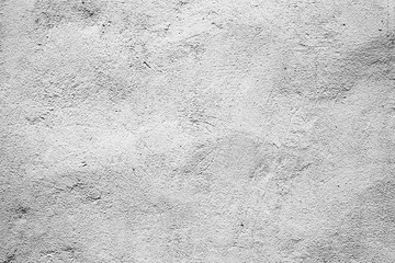 Texture of a concrete wall with cracks and scratches which can be used as a background