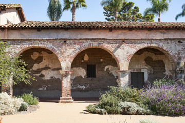 Fototapeta na wymiar Arch and pillar design in a Historic Spanish Mission Church in California During the Day