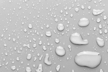 Drops of water on a color background.