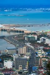 Obraz na płótnie Canvas HIGH ANGLE VIEW OF CITYSCAPE BY SEA