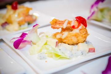 Crispy shrimp on a serving plate ready to be served