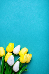 Background of spring flowers for card for the holiday. Women's Day. Selective focus. Vertical. Top view. Background with copy space.