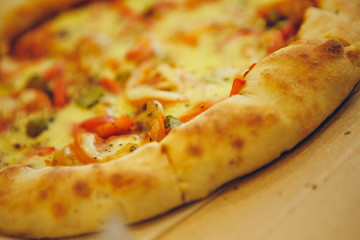 pizza with tomatoes, olives and cheese close up. fast food advertising, confectionery, cooking, overeating, diet, Italian food