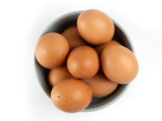 Put eggs in one bowl on white background