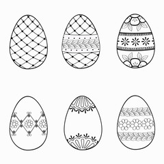 Easter eggs with ornament set. Hand-drawn doodle outline elements for festive decoration of banners, icons and greeting cards. Coloring page. Stock vector illustration isolated on white background.