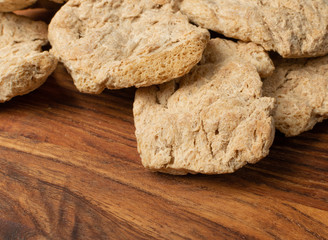 Raw Dehydrated Soy Meat or Soya Chunks on Wood Background