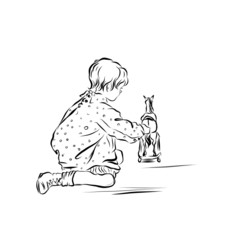 little boy plays with a toy horse