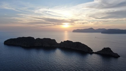 Fototapeta premium Scenic view on the beach of Mallorca against dramatic sky during sunset