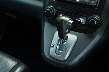 Fototapeta na wymiar Put a gear stick into P position, (Parking) Symbol in auto transmission car.