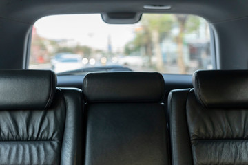 Car interior, part of back seats.