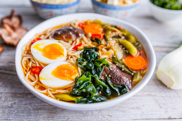 Ramen soup with noodles and traditional ingredients.