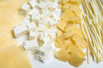 Cheese cut into different varieties