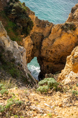Scenic natural cliff formations sea landscape of Algarve coastline with turquoise water at Ponta da Piedade, in Algarve Portugal