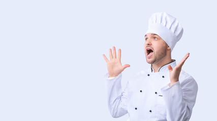 Excited Chef In Uniform Shouting Standing On White Background, Panorama