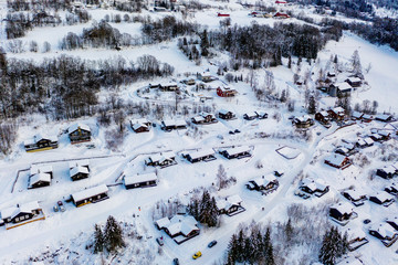 Aerial view of ski resort Hafjell in Norway with houses in winter