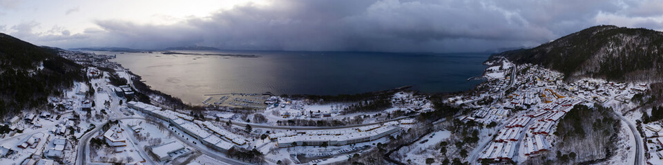 Aerial view of residential area in Molde, Norway during a cloudy day in winter