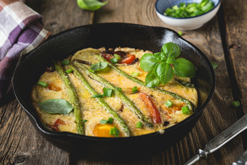 Frittata. Italian omelet with asparagus and bell pepper