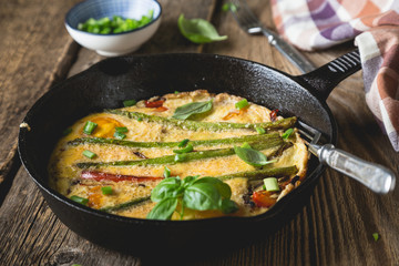 Frittata. Italian omelet with asparagus and bell pepper