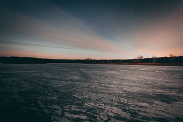 Evening sunset in the winter forest