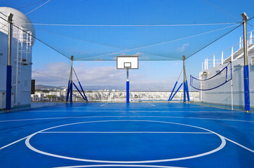 Basketball and sports court on outdoor deck of modern cruise ship liner or cruiseship