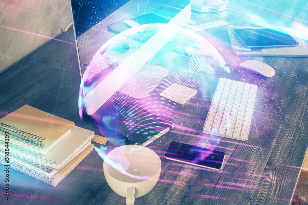 Poster computer on desktop in office with technology theme hologram. multi exposure. tech concept.