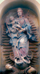 Ancient statue of the Virgin Mary with Jesus Christ of Nazareth.