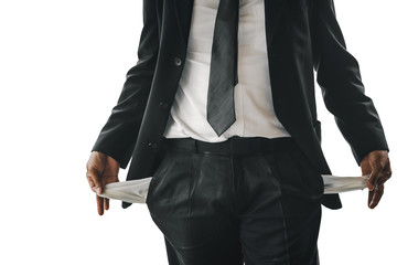 Businessman shows in empty bag, no money at all on a white isolated background.