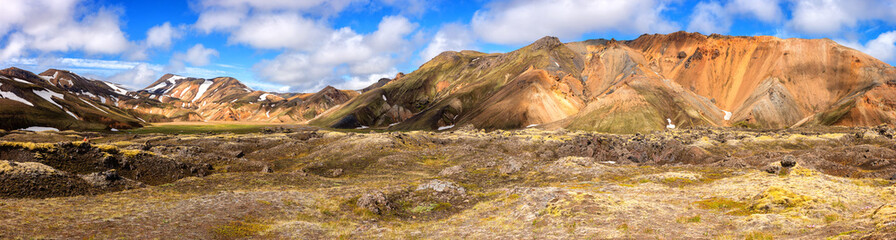Fototapeta na wymiar Amazing landscape, colorful volcanic mountains and valley Landmannalaugar in the Fjallabak nature reserve, Iceland. Outdoor travel background, panoramic view of famous tourist destination