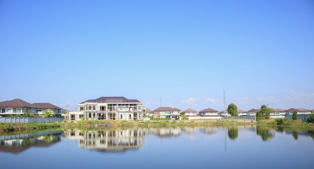 New residential house contemporary style building in progress at construction site