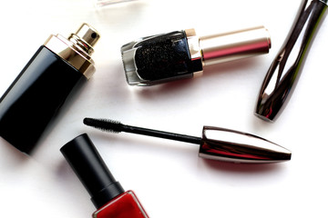 different beauty products on white background
