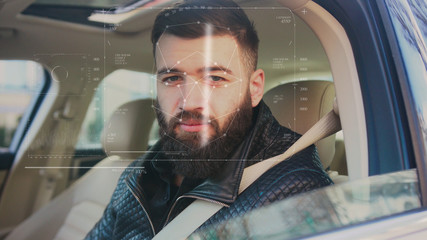 Future. Face Detection. Technological 3d Scanning. Biometric Facial Recognition. Face Id. Technological Scanning of the Face of Handsome Caucasian Man In The Car for Facial Recognition. Shoted by Arri