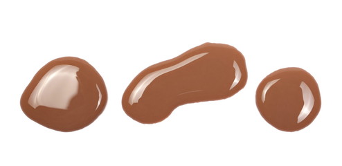 Chocolate milk puddle, drops isolated on white background, top view