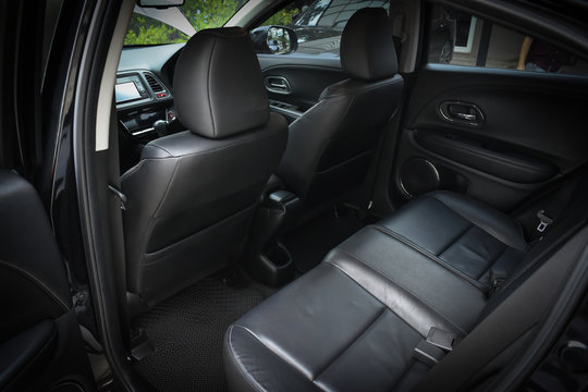 black leather of back seat interior inside modern vehicle car automobile