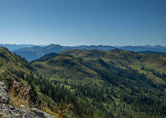 Fototapeta premium view over the Alps mountain panorama with view of the schneeberg hochkönig in Austria