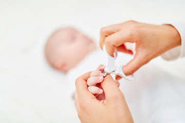 Careful nail care in a baby