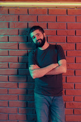 Cheerful young man in a nightclub