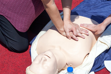 Obraz na płótnie Canvas First aid CPR training detail