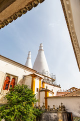 Courtyard of the Palace of Sintra witha view on the two giant white chimneys located in the town of Sintra, in the Lisbon District of Portugal