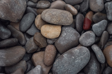 Fototapeta na wymiar abstract background with round peeble stones