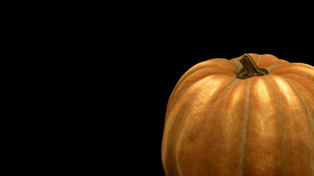 rotating pumpkin on black background with alpha channel . 3d 4K